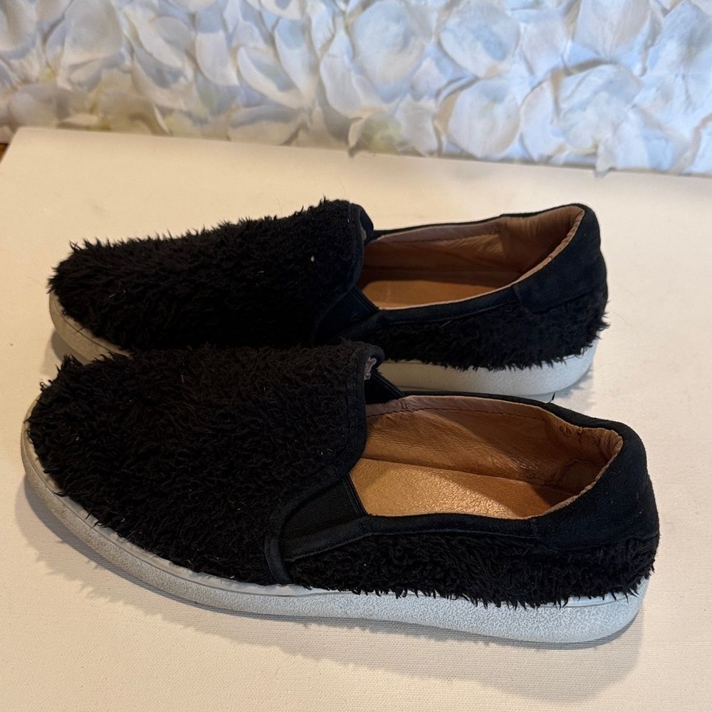 UGG Black Fuzzy Slip-On Sneakers with White Soles - Picture 2 of 3
